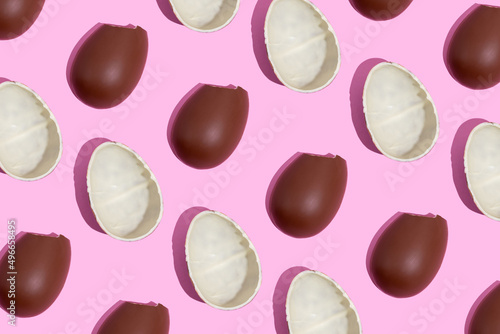 Chocolate eggs. Easter eggs. Seamless pattern of chocolate eggs on a pink background. Easter sweet chocolate background