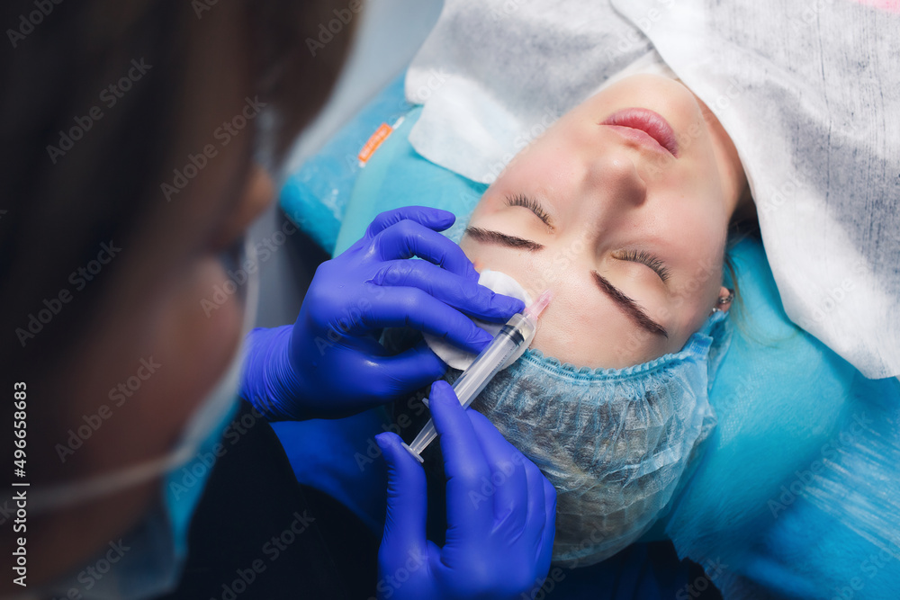 real mesotherapy procedure in the face of girl. Skin injections for rejuvenation real mesotherapy procedure in the face of girl. Skin injections for rejuvenation