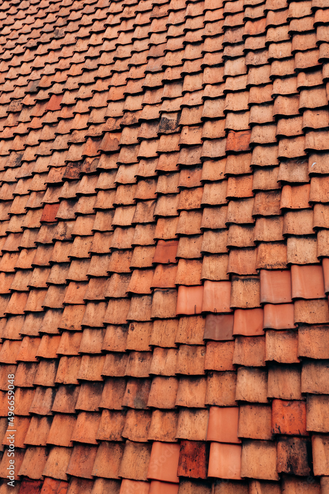 The texture of the roof of the roof, made of shingles. The texture of shingles. Background 