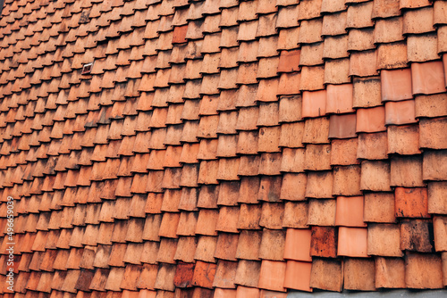 The texture of the roof of the roof  made of shingles. The texture of shingles. Background 
