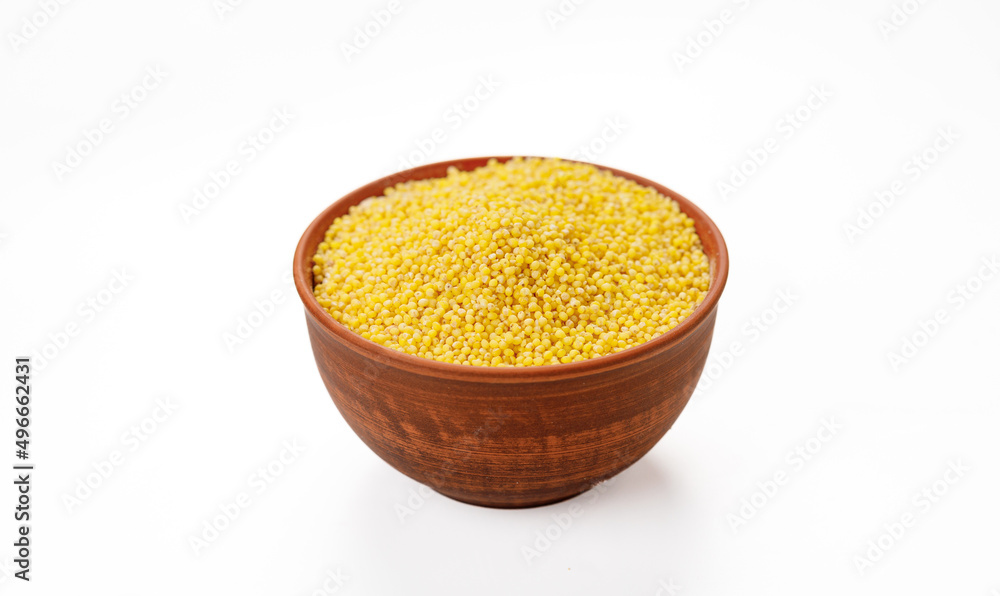 Millet polished in bowls and bags isolated on a white background. High quality photo Millet polished in bowls and bags isolated on a white background. High quality photo