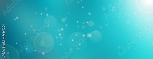 Turquoise background with beautiful bokeh effect.
