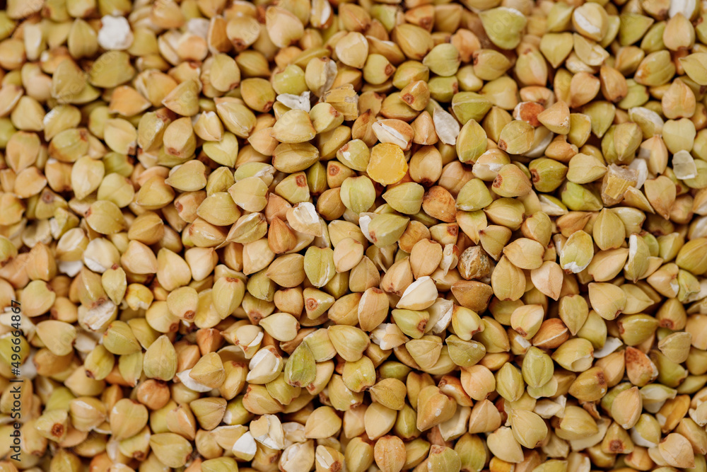 Buckwheat groats texture background. High quality photo Buckwheat groats texture background. High quality photo