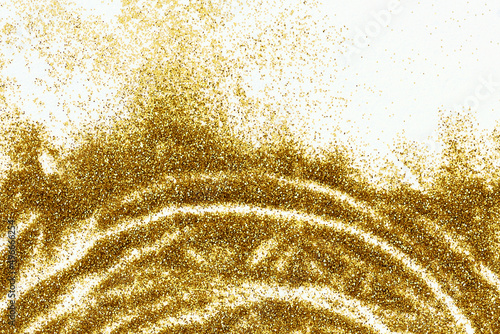 Closeup of golden glitter d...