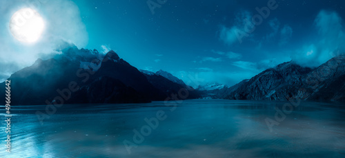 Magical Night Scene with Full Moon in cloudy sky. Mountain Landscape