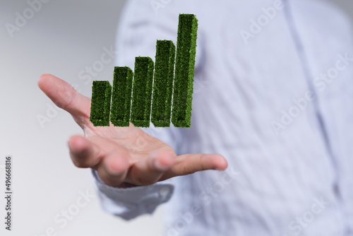 Businessman hand holding st...
