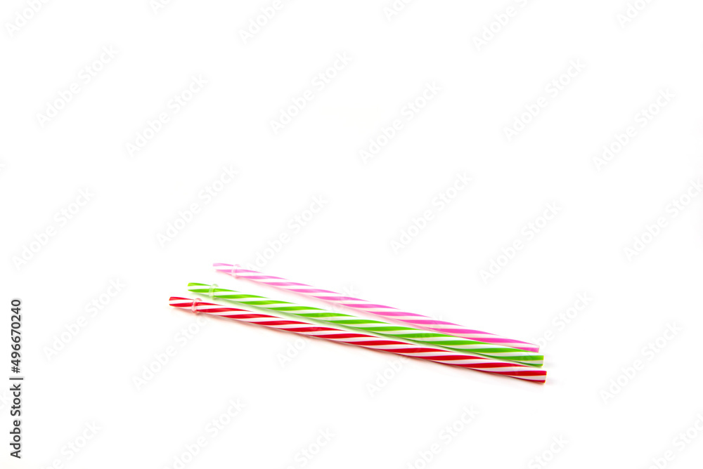 colorful drinking straws on white background