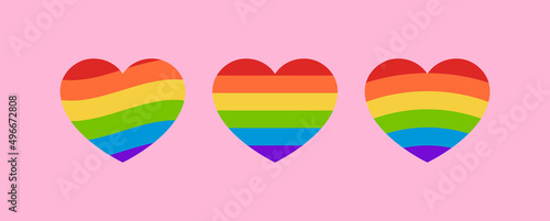 Gay Pride Rainbow Flag Heart Set. Set of Heart Icons with LGBT Rainbow Flag Pattern. Vector Rainbow Heart Illustrations Isolated on Pink Background