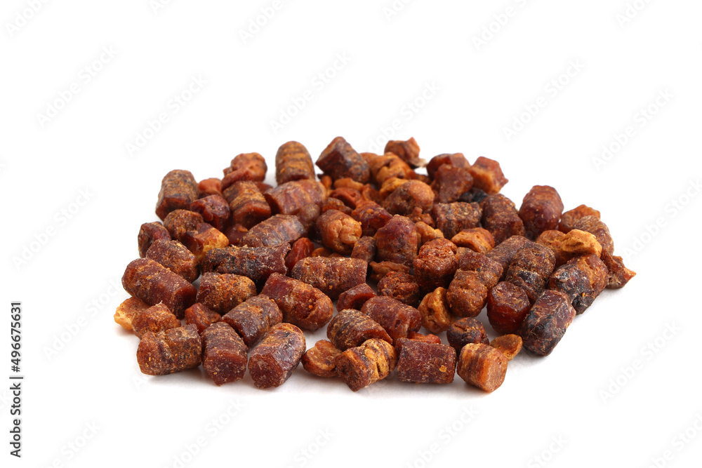Bee bread isolated on a white background. Pile of granules bee bread isolated. Scattered Perga Bee bread isolated on a white background. Pile of granules bee bread isolated. Scattered Perga