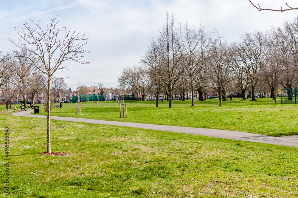 Obraz premium London, United Kingdom, 15 March 2022: Plashet Park first opened in 1891. Remarkably its original layout has remained relatively how it was. 