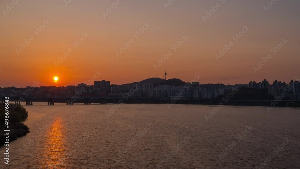 Time lapse 4K Seoul city sunset skyline and Seoul tower at han river. South Korea. Time lapse 4K Seoul city sunset skyline and Seoul tower at han river. South Korea.