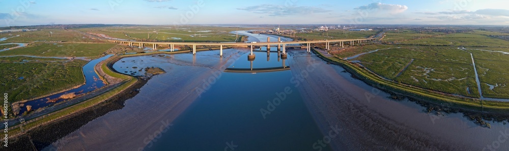 Aerial drone view of Kingsferry Bridge or Sheppey Crossing, double motor and rail bridge connecting Kent and Swale with the Isle of Sheppey in England
