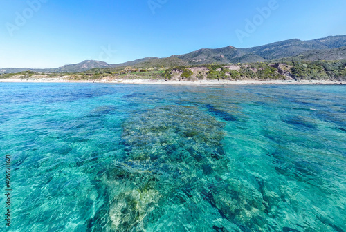 Turquoise sea in La Speranza beach on a sunny day © Gabriele Maltinti