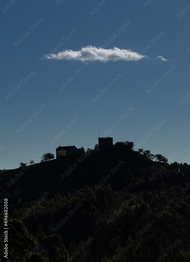 The Lanhoso Castle under a beautiful white cloud, Povoa de Lanhoso, Braga, Portugal. The Lanhoso Castle under a beautiful white cloud, Povoa de Lanhoso, Braga, Portugal.