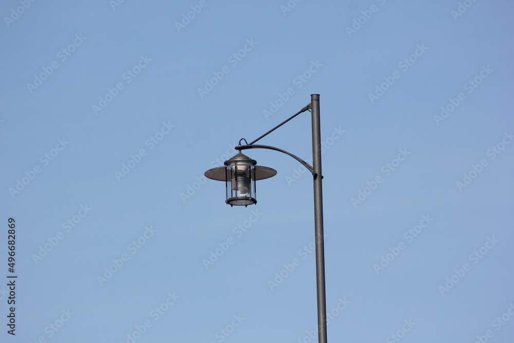 Urban light with blue sky background - Electric energy technologies Urban light with blue sky background - Electric energy technologies