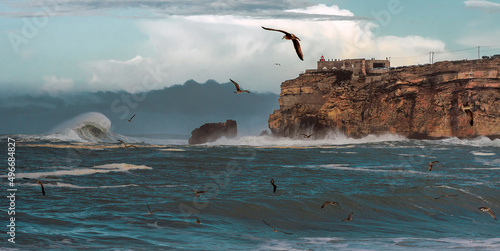 Big waves in Nazare, Portugal. Waves of the Atlantic Ocean in Portugal. Waves for surfing.