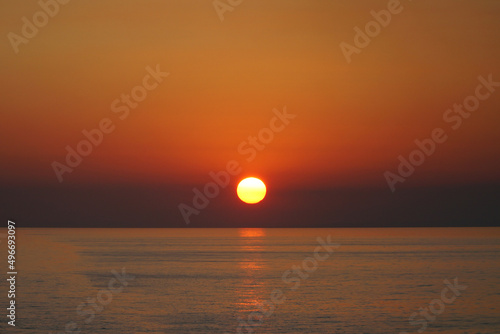 A golden sunset over the ocean © David