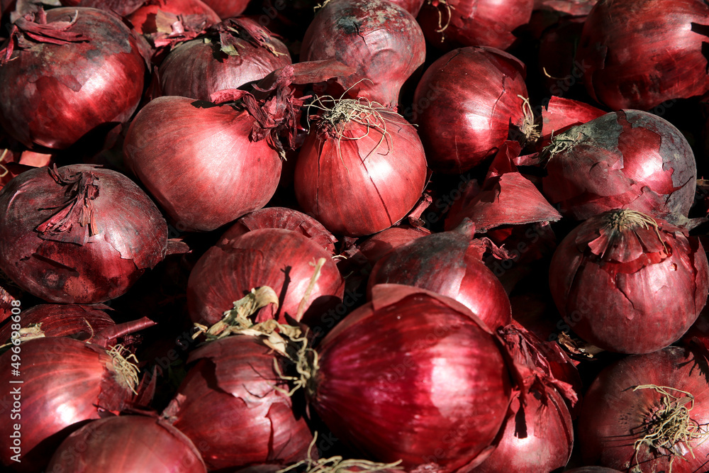 Purple Onions for sale at a market stall Purple Onions for sale at a market stall