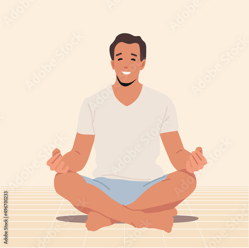 Man Meditating Indoors Doing Yoga Asana in Hall Sitting in Lotus Pose. Concentration, Healthy Life, Relaxation, Zen
