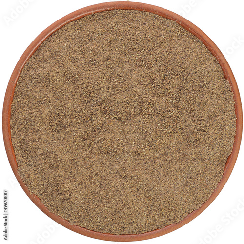 Murais de parede Ground allspice in a brown ceramic bowl isolated on white background