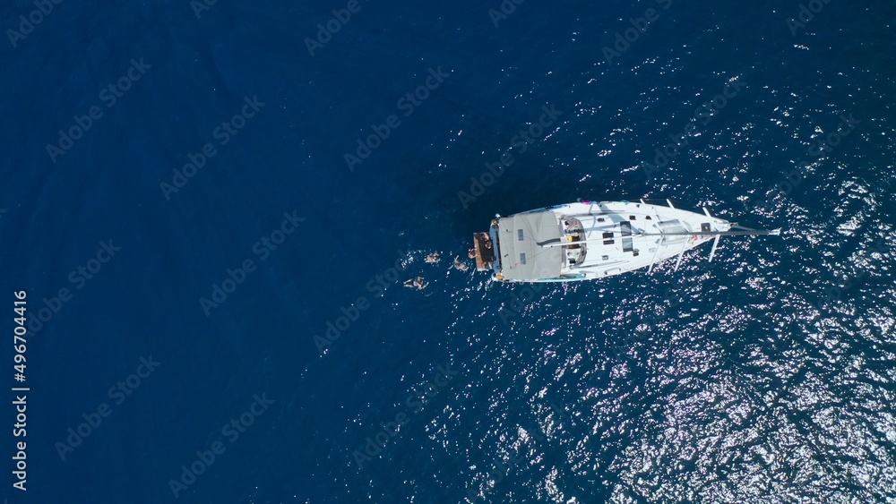 Fototapeta premium Top view of sail boat in the sea. 