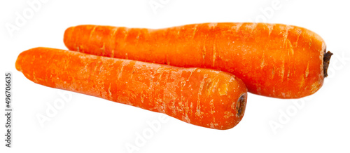 Raw unpeeled carrots, ingredients for cooking at home. Isolated over white background