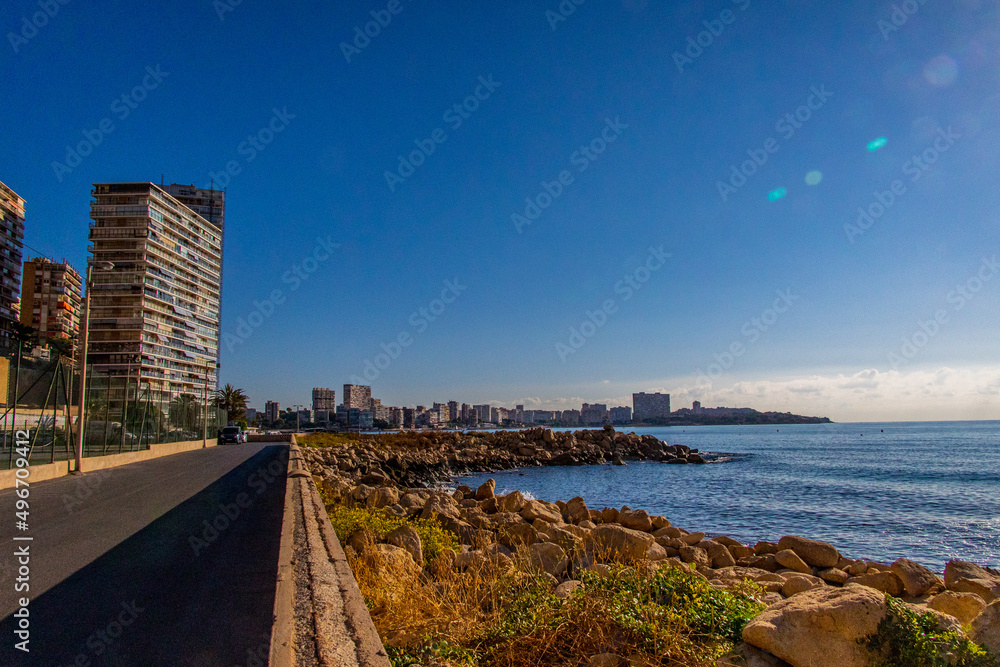 seaside landscape of alicante spain with sea and skyscrapers on a sunny day