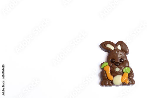  sweet rabbit-shaped chocolate for easter on a light background © Joanna Redesiuk
