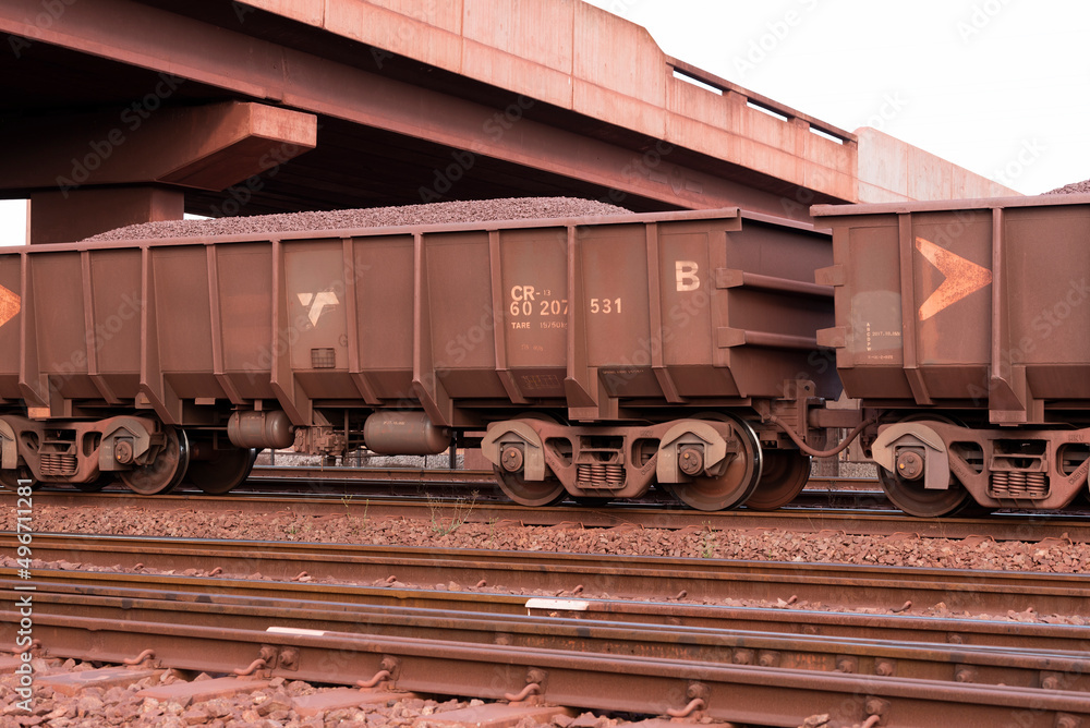 Saldana, South Africa. 2022. Railway trucks carrying iron ore for export to China Saldana, South Africa. 2022. Railway trucks carrying iron ore for export to China