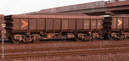 Saldana, South Africa. 2022. Railway trucks carrying iron ore for export to China photo