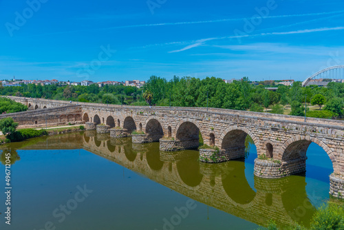 Roman bridge over river Guadiana leading to Alcazaba fortress in Merida, Spain. photo