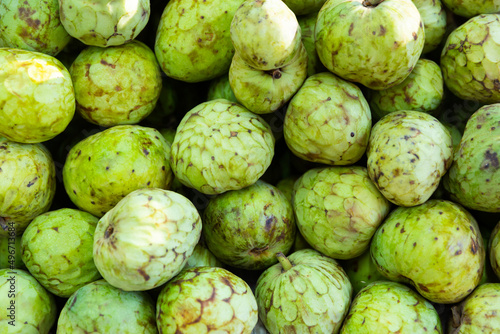 Fresh delicious cherimoya, put up for sale on the counter in the store
