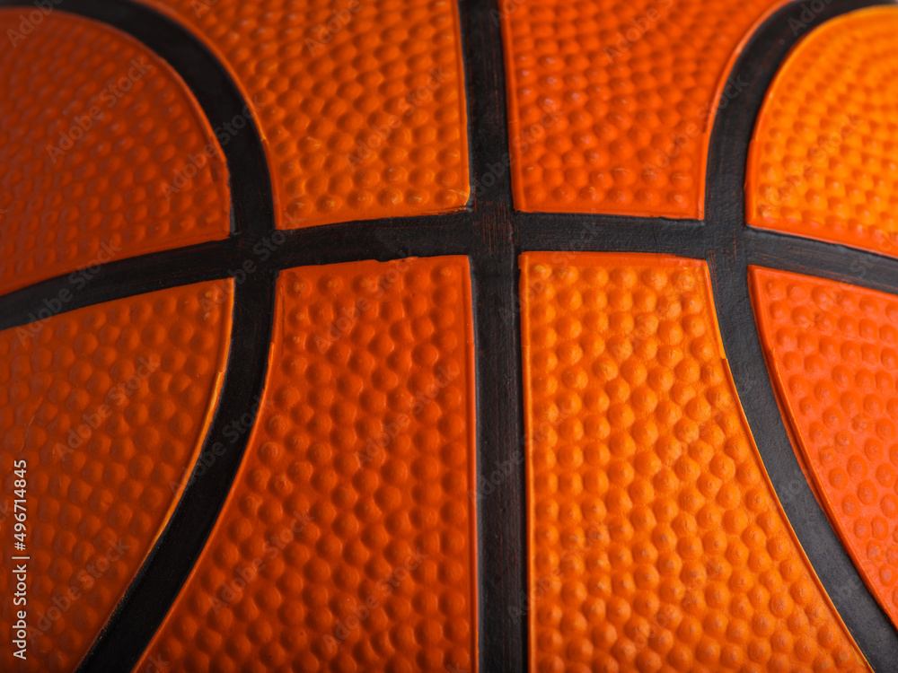 Obraz premium Macro shot. Basketball. Details. Sports games, training, professional and amateur sports, healthy lifestyle. There are no people in the photo. Advertising. Banner.