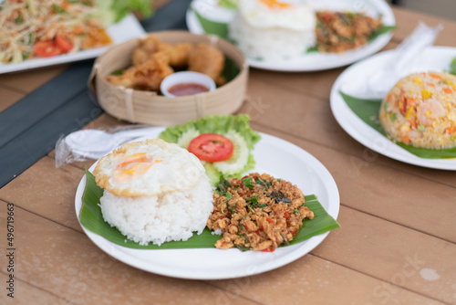  basil pork rice with fried egg . thai food