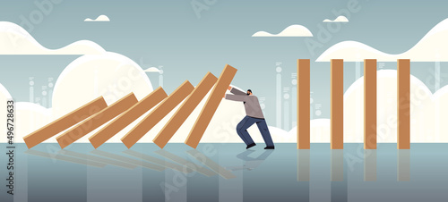 stressed businessman stopping domino effect crisis management chain reaction finance intervention conflict prevention