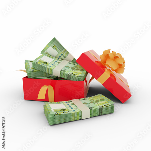 Stack of Lebanese pound notes inside an open red gift box. Bundles of Lebanese pounds inside a gift box. 3d rendering of money inside box isolated on white background photo