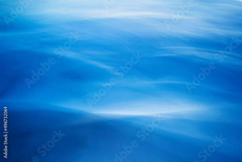 Abstract light blue background, glossy motion blur. Modern creative arp wallpaper, colourful, beautiful, abstract design.