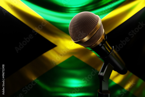 Microphone on the background of the National Flag of Jamaica, realistic 3d illustration. music award, karaoke, radio and recording studio sound equipment