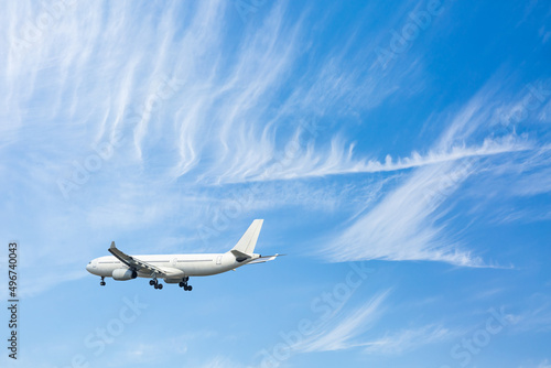 Airplane flying in blue sky. travel concept.