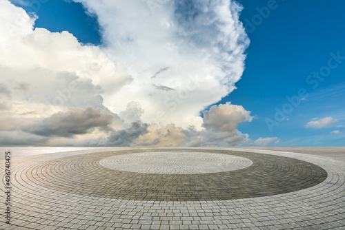Round city square floor and sky clouds under blue sky