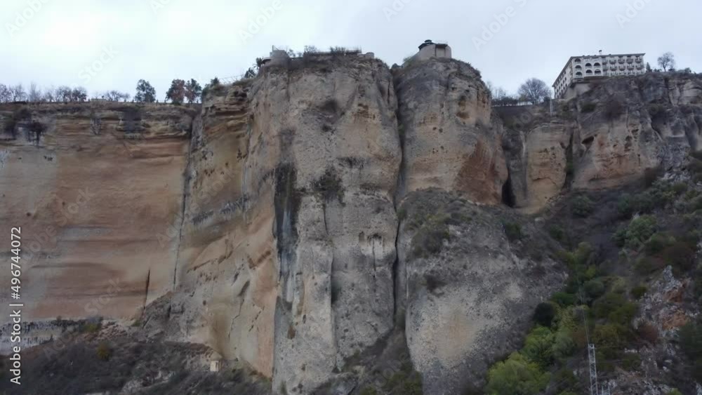 Impressive tall vertical limestone cliffs below Spanish town, Ronda Impressive tall vertical limestone cliffs below Spanish town, Ronda