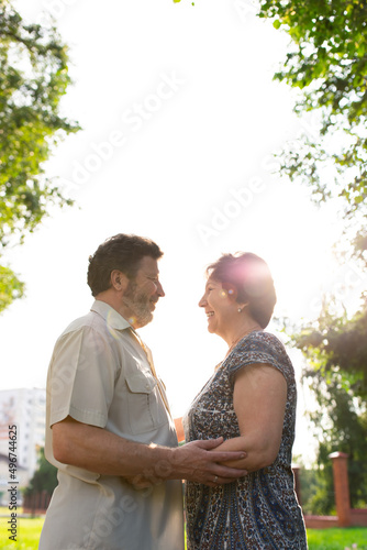 Happy mature couple. Date and walk, portrait of two spouses. Front view.