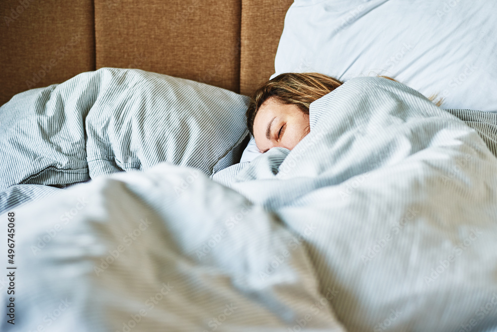 Woman sleeping in the bed at morning Woman sleeping in the bed at morning