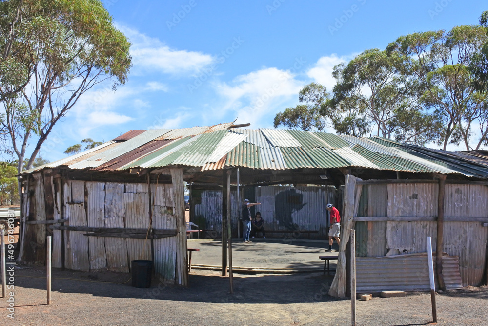 Two-up a traditional Australian gambling game throwing two coins into the air