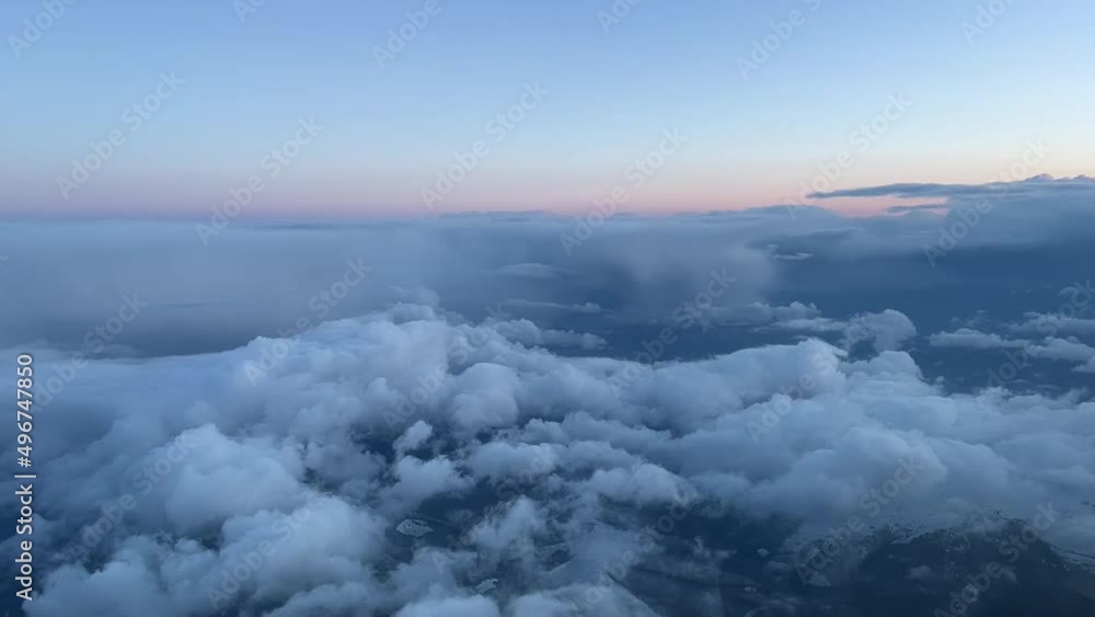 Aerial cockpit view in a cold winter moornig with some snow clouds during the approach to Bilbao’s airport Aerial cockpit view in a cold winter moornig with some snow clouds during the approach to Bilbao’s airport