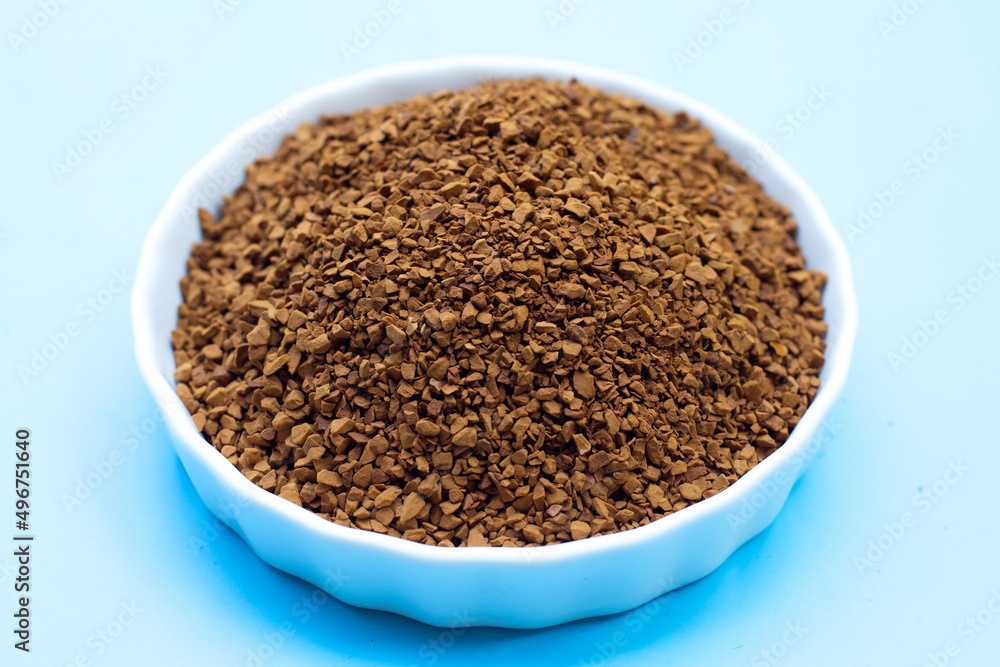 Instant coffee on blue background. Instant coffee on blue background.