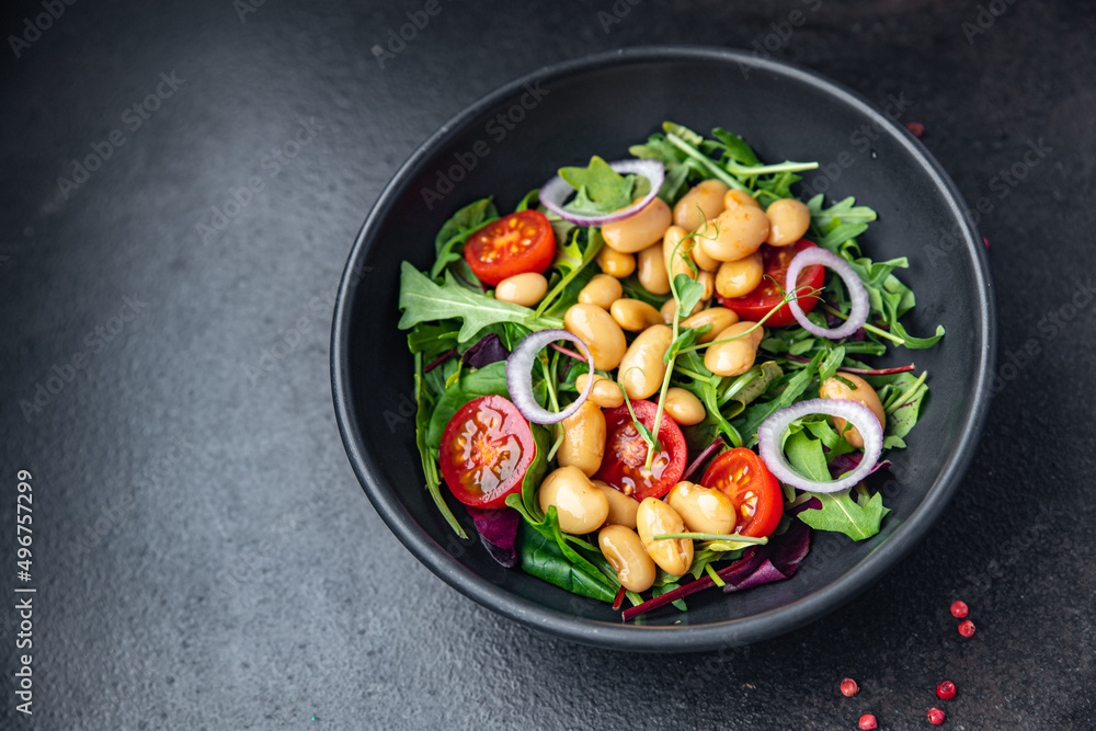 salad bean tomato, onion, lettuce leaves mix fresh healthy meal diet snack on the table copy space food background keto or paleo diet veggie vegan or vegetarian food salad bean tomato, onion, lettuce leaves mix fresh healthy meal diet snack on the table copy space food background keto or paleo diet veggie vegan or vegetarian food
