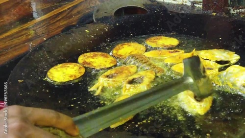 Frying Padma Ilish Fish at Mawa Ghat Bangladesh photo