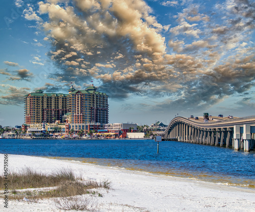 Bridge to Destin and city hotels under a sunset winter sky, Florida. photo