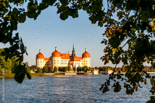 Germany, Saxony, Moritzburg, View of lake with Moritzburg Castle in background photo